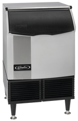 A stainless steel under counter ice maker with a black lid labeled ICE at the top. The front displays a Cornelius logo. The unit produces full-size cubes and features four metal legs plus black vent panels at the bottom.