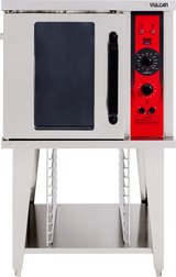 A stainless steel electric convection oven with a black glass door on the left and red control panel on the right, sitting on a metal stand with multiple shelf slots underneath. The brand name “Vulcan” appears at the top right.