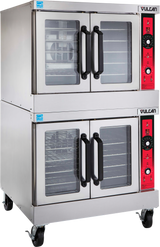 A double-deck Vulcan SG44 convection oven with stainless steel finish, glass doors, black handles, red control panels with dials, and wheels for easy mobility. Oven interiors feature racks for cooking multiple items at once. Vulcan branding is visible on both units.