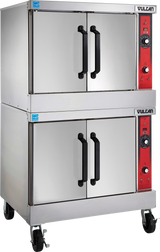 A double-stacked commercial stainless steel convection oven with two sets of black handles, red control panels, temperature dials, four caster wheels for mobility, and the Vulcan brand visible on the upper right.