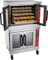 A commercial stainless steel Vulcan double-deck convection oven with its top door open reveals multiple racks filled with trays of baked rolls. The gas oven features red control panels, black handles, and is mounted on caster wheels for mobility.