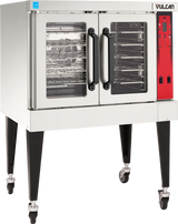 A commercial stainless steel Vulcan single-deck electric convection oven on wheels, featuring a red control panel on the right, two glass doors with black handles, and wire oven racks visible inside. The oven stands on four black legs with casters.