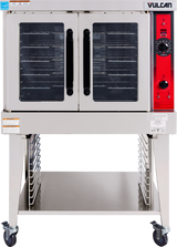 This commercial stainless steel gas convection oven features two glass doors, black handles, multiple wire racks, and control knobs on a red panel. It stands on a metal open-frame base with wheels and a lower storage shelf.