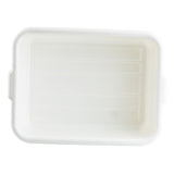A rectangular white plastic Tote Box tray with rounded corners, shallow depth, and two small side handles. The inner surface has raised horizontal ridges. Stackable and dishwasher safe, the tray is empty and viewed from above on a white background.