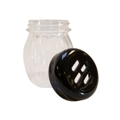 A clear, BPA free plastic shaker jar with a wide mouth and textured sides is shown, its black lid with three rectangular slots resting in front. Ideal for dispensing cheese or spices, this jar is dishwasher safe. The background is white.