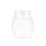 A clear, empty glass jar with a wide mouth, subtle vertical grooves, and a red slotted plastic top. The jar’s rounded body tapers slightly at the top and bottom. BPA Free, it rests against a plain white background.