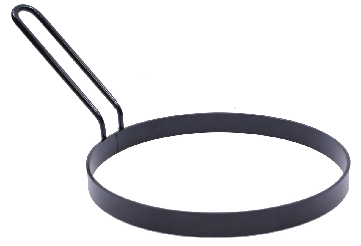 A black metal TableCraft pancake ring with a non-stick circular mold and a long upright handle, designed to keep eggs or pancakes neatly shaped while cooking. The handle is attached to one side of the ring. The background is plain white.