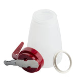 A translucent BPA free plastic container lies on its side next to a red and silver levered lid and a white circular sealing ring, all isolated on a white background. The wide mouth syrup dispenser is dishwasher safe for easy filling and cleaning.