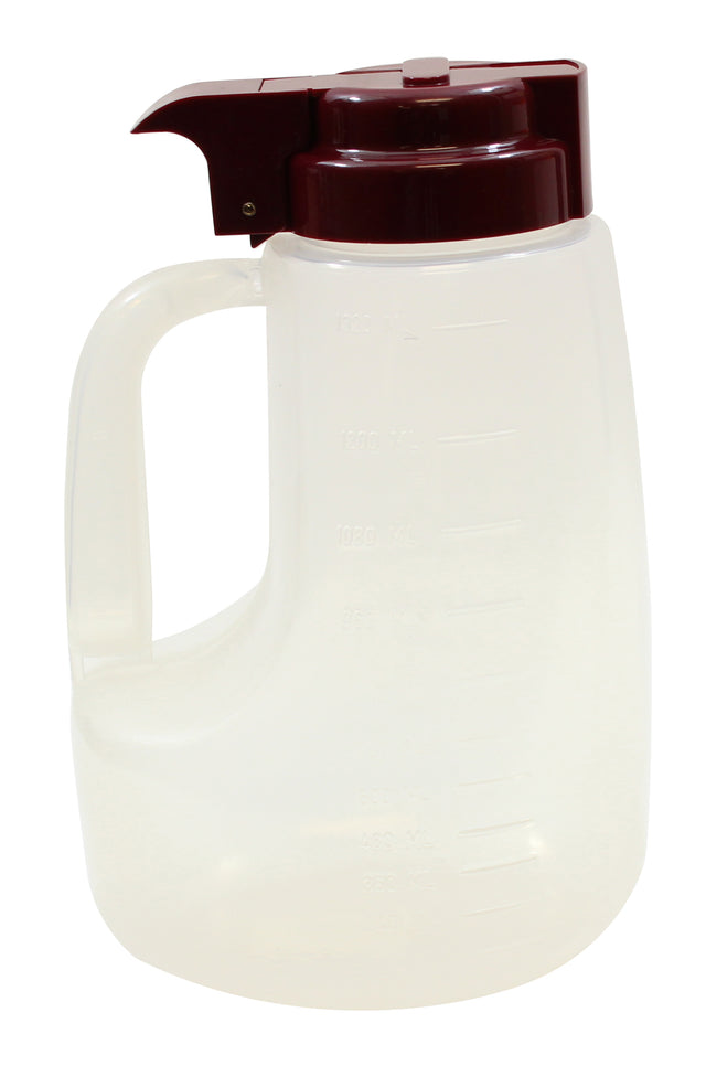 A large, clear 48 oz dispenser with an ergonomic handle, measurement markings on the side, and a dark red flip-top spout lid. The Option Dispenser is dishwasher safe and empty, set against a white background.
