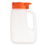 A clear BPA free plastic pitcher with measurement markings and an orange flip-top spout lid. This 48 oz dispenser features a large handle and wide body, making it simple and functional for easily pouring liquids.