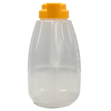 A clear, empty 64 oz plastic squeeze bottle with a wide base and a bright yellow flip-top cap. The BPA free bottle is slightly ribbed on the sides, with measurement markings molded into the plastic, and photographed against a plain white background.