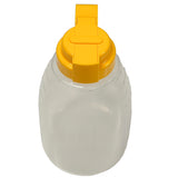 A translucent BPA free plastic container with a wide body and yellow flip-top lid, viewed from above. The 64 oz option dispenser features a rectangular opening tab and subtle measurement markings on the surface.