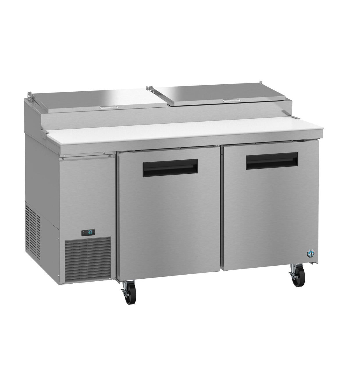 A commercial Hoshizaki stainless steel pizza prep table with two doors, a digital temperature display, black handles, four caster wheels, and a white cutting board on top. Rear features two metal compartment lids for ingredient storage.
