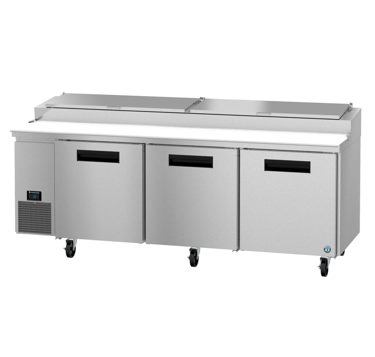 A large Hoshizaki Steelheart stainless steel pizza prep table with three front doors, digital temperature display on the left, top lid ingredient storage sections, black handles, and caster wheels for mobility.