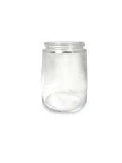 A clear, empty glass sugar jar with a wide opening and no lid, shown against a plain white background. The cylindrical Vollrath 930J features smooth sides, a thick base, and casts a faint shadow below it.