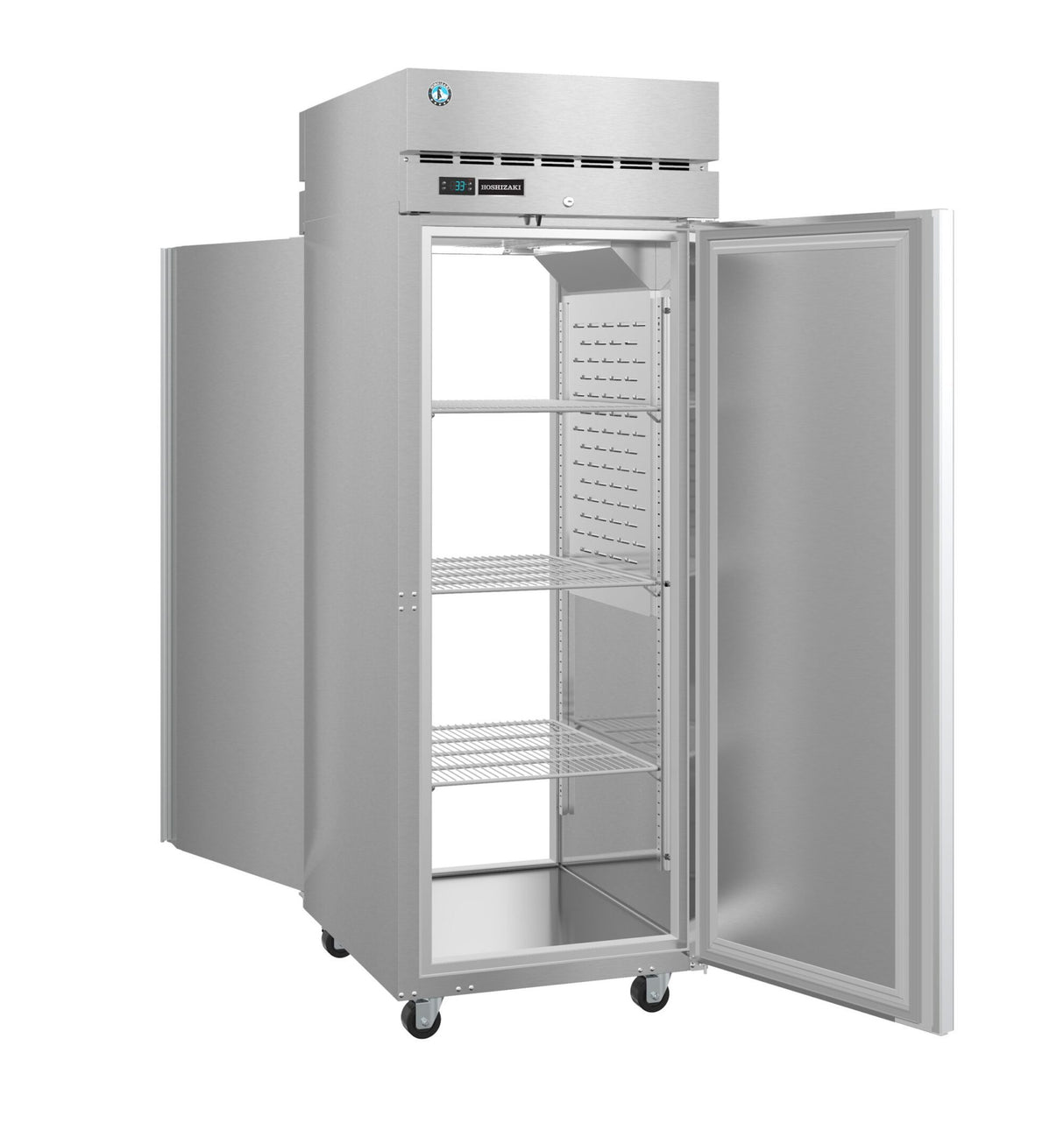 A commercial stainless steel refrigerator stands on four wheels, its single door open to reveal three metal wire shelves inside. The exterior is modern and industrial, featuring a digital control panel above the door. The pass-thru refrigerator is clean and empty.