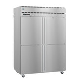 A large Hoshizaki refrigerator with four doors, part of the Steelheart Series Refrigerator line, sits on four small wheels. The upper section features vents and a digital control display on the left. The smooth metallic surface enhances its sleek look.