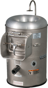 The Hobart 6115-11 is a commercial stainless-steel portable potato peeler and vegetable peeler with a cylindrical body, top chute for loading, front door with handle, dial control, safety labels, and a curved rinsing water pipe.