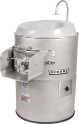 A large, industrial stainless steel Hobart 6430-3 Vegetable Peeler with a round top, side chute, control panel, and the Hobart brand name on the front. A metal pipe extends upward from the top and safety instruction labels are visible.