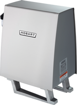 A stainless steel Hobart PD-70 Power Drive Unit, possibly a commercial slicer, with a boxy design, prominent logo on the front, angled top, visible warning label on the side, and sturdy metal legs on a white background.