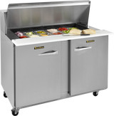 Food trays sit on a counter with a sleek stainless steel exterior, adding a modern touch to your serving setup.