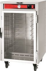 A stainless steel heated cart with durable stainless steel construction, this mobile sheet pan cart features a glass front door, interior wire racks, a temperature gauge, and control knob on a red "Vulcan" panel—perfect for keeping hot food trays ready to serve.