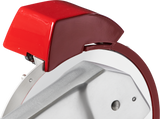 Close-up of a Berkel Fly Wheel Slicer featuring a shiny, chromium-plated carbon steel knife partially covered by a red protective guard. The slicer has a silver-gray angled handle in the foreground, with clean edges and a small screw visible.