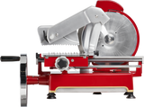 A close-up side view of a Berkel Fly Wheel Slicer with a red and silver finish, featuring a chromium-plated carbon steel knife, a left-side handle, and adjustment knobs. The slicer’s detailed mechanical parts stand out against a white background.