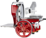 A red and silver vintage-style Berkel 330M Fly Wheel Slicer with a large decorative hand crank, Chromium-plated Carbon Steel Knife, shiny blade, stainless steel tray, and white handle components, viewed from the side.