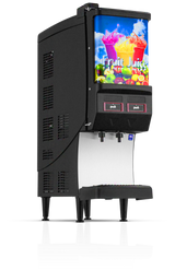 A black countertop juice dispenser with two push-button valves, labeled “push,” features a colorful image of assorted fruits and the words “Fruit Juice” on the front. The machine stands on four legs with a drip tray below the spouts.