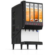 A black and silver countertop iced latte dispenser features four labeled sections with drink images above 4 push-button valves: Iced Latte, Caramel Iced Latte, Mocha Iced Latte, and Vanilla Iced Latte. The machine stands on four legs.
