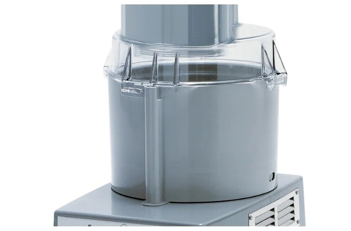 A close-up photo of a Robot Coupe R101P Combination Food Processor shows its large cylindrical bowl with a clear plastic lid and feed tube, securely attached to the metal base. The machine is clean, sturdy, and offers a vegetable prep function for heavy-duty kitchen use.
