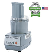 A silver Robot Coupe R101P Combination Food Processor with a clear bowl and lid sits on a white background. A green and gray badge advertises a 1-year hassle-free warranty, while a small American flag appears beside it.