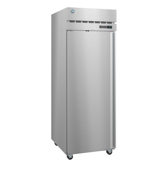 A tall, stainless steel Steelheart Series reach-in refrigerator stands on four wheels. Featuring a single solid door, ENERGY STAR digital display and control panel, and vents above the door, its sleek design suits modern professional kitchens.
