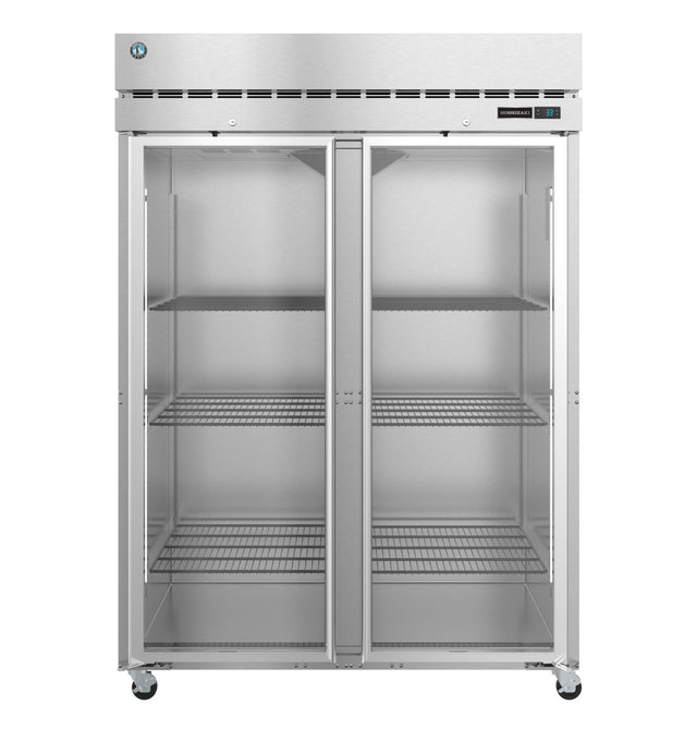 A Steelheart Series reach-in refrigerator with two clear glass doors, six adjustable wire shelves, and four wheels at the base. The refrigerator is empty, with a digital control panel visible in the top right corner on the front.