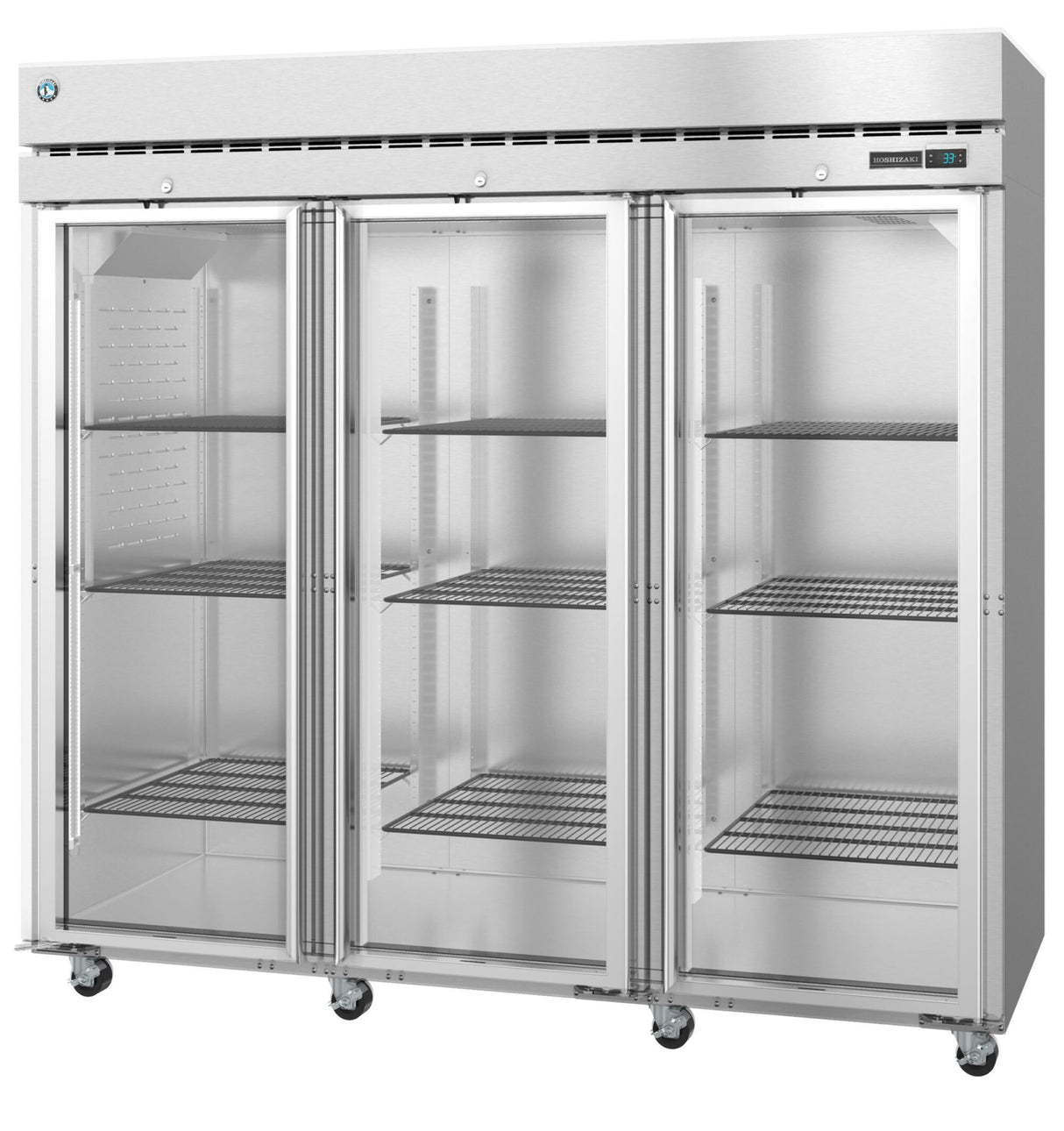 A large Steelheart Series Refrigerator with three glass doors showcases multiple wire shelves inside. This reach-in refrigerator stands on wheels for mobility and features a digital temperature display on the top right corner.