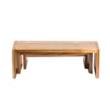 A rectangular acacia wood coffee table with a natural finish, clean lines, and slightly outward-angled legs. The minimalist, modern design highlights the wood grain and craftsmanship. Perfect as a standalone piece or paired in a nesting set. Photographed on white background.