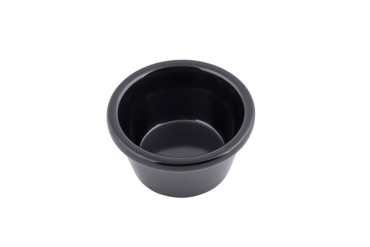 A small, plain, round black 2 oz melamine ramekin with smooth surfaces and a slightly flared rim, shown on a white background. The bowl appears empty and is often used for sauces, condiments, or dips.