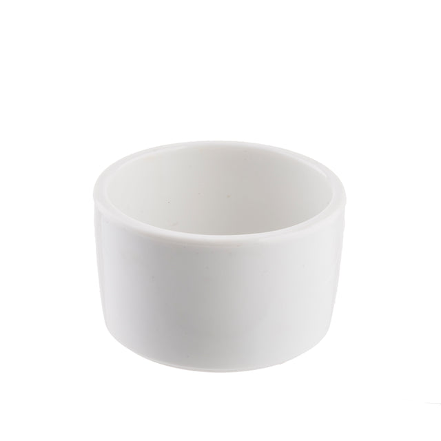 A plain, white 2 oz. ramekin with smooth sides and a slightly flared rim, photographed on a white background. The empty ramekin is centered in the image, with soft shadows visible around its base.