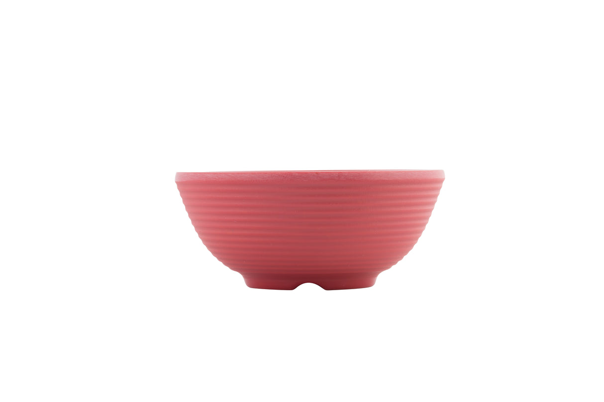 A small, round, ridged 2 oz ramekin in matte pink ceramic is centered on a white background. The bowl has a slightly flared lip and sits on a short, footed base. The simple, modern design emphasizes its textured surface.