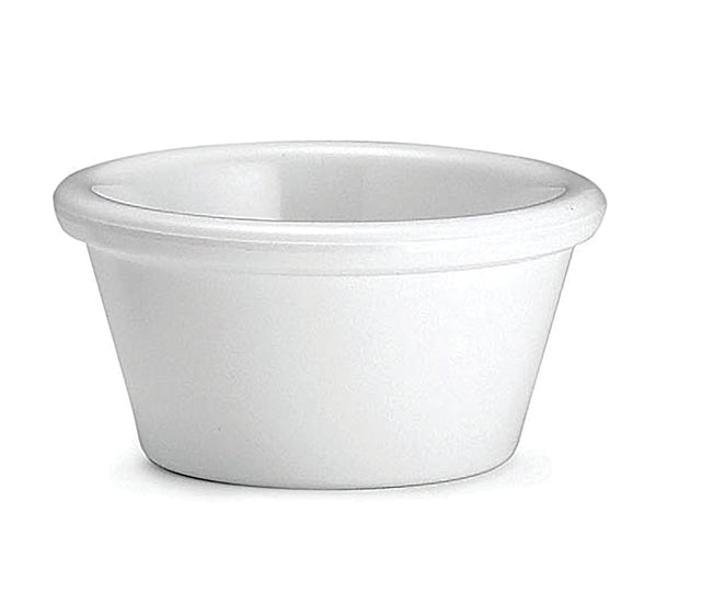 A small, white, round ceramic ramekin with smooth sides and a slightly flared rim is shown on a plain white background. The ramekin is dishwasher safe and ideal for baking or serving individual portions.