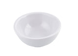 A plain, empty white SaferFoods Solutions Ramekin with a smooth glossy finish and subtle horizontal ridges on the exterior, shown against a white background. The bowl features a rounded shape and a slightly thick rim.