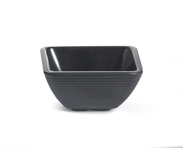 A square-shaped black melamine bowl with gently flared sides and horizontal textured ridges on the exterior, resting on a white background. The bowl has a glossy interior, matte finish outside, and is dishwasher safe.