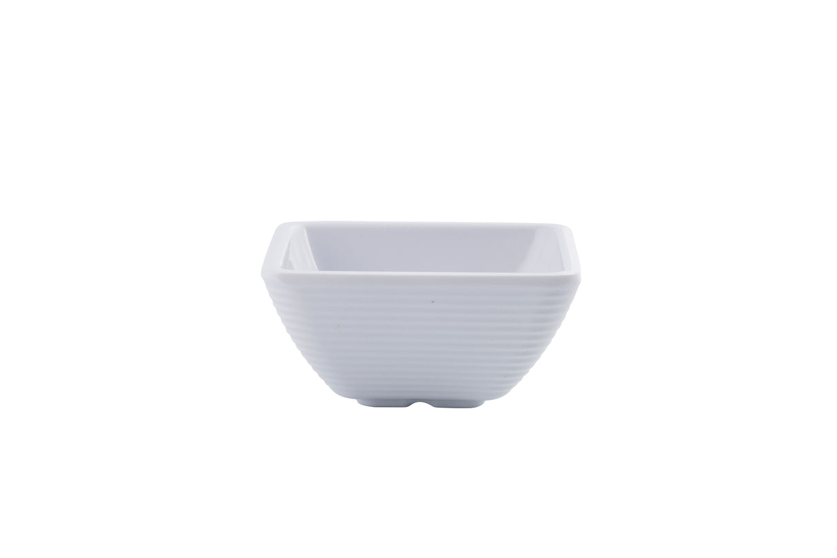 A small, white, square ceramic ramekin with slightly flared sides and a ridged texture. The glossy, empty bowl is placed against a plain white background.