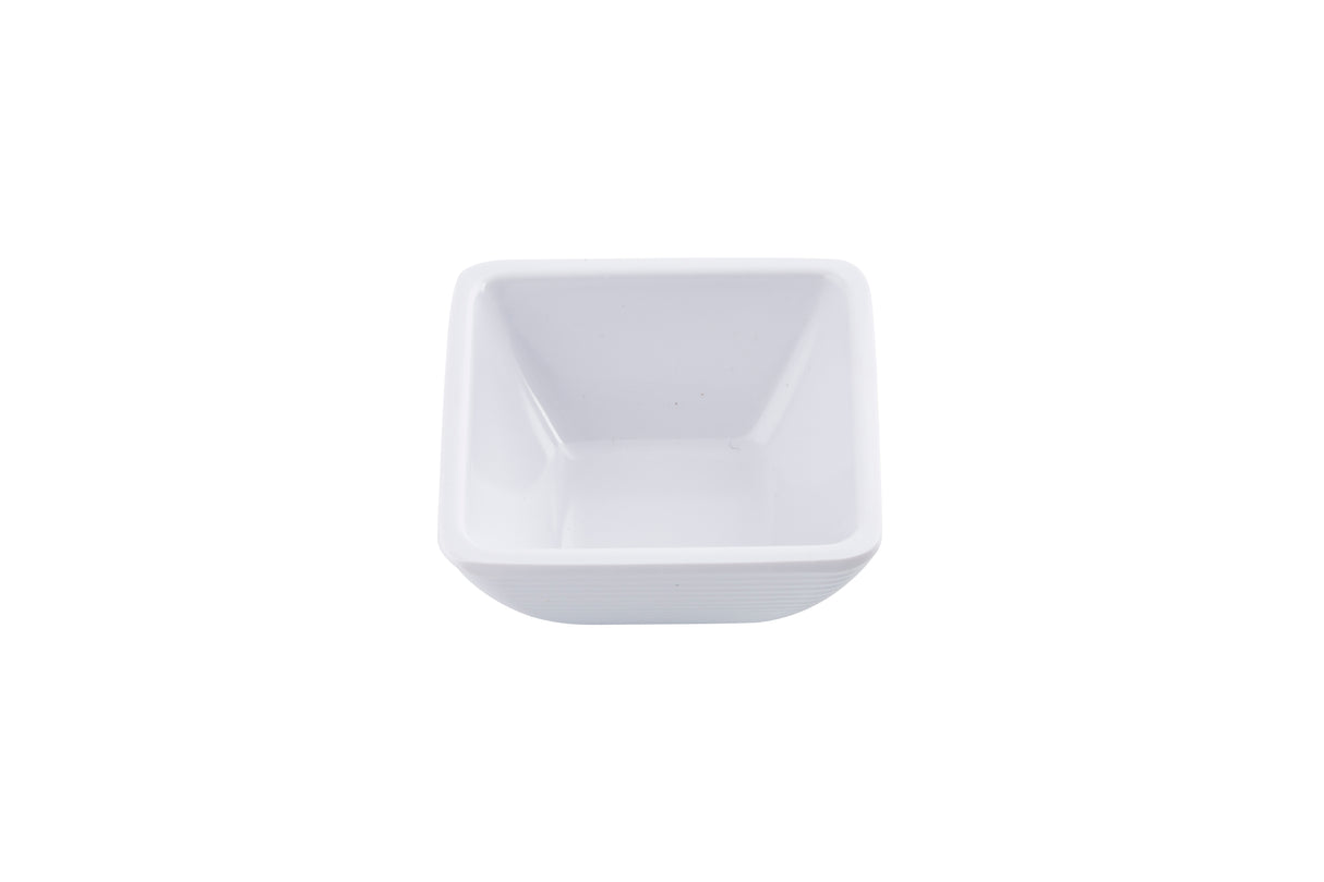 A small, empty, white ramekin with slightly rounded edges is centered on a plain white background. Made of smooth ceramic or porcelain, this bowl is dishwasher safe and features a clean, simple design.