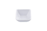 A small, empty, white ramekin with slightly rounded edges is centered on a plain white background. Made of smooth ceramic or porcelain, this bowl is dishwasher safe and features a clean, simple design.