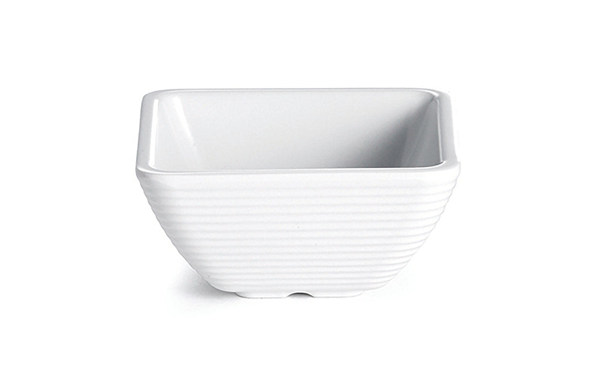 A small, square, white SaferFoods Solutions ramekin with slightly rounded corners and horizontal ridges along the exterior. The bowl has a smooth, glossy finish and is empty, photographed against a plain white background.