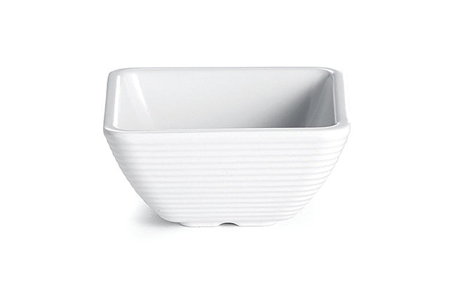 A small, square, white SaferFoods Solutions ramekin with slightly rounded corners and horizontal ridges along the exterior. The bowl has a smooth, glossy finish and is empty, photographed against a plain white background.