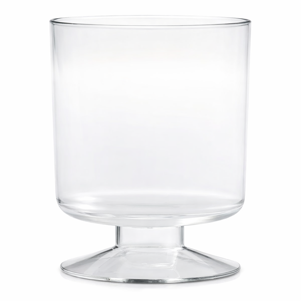 A clear glass trifle bowl with straight sides, a wide opening, and a sturdy, thick pedestal base. The bowl is empty, reminiscent of a JB Prince disposable goblet glass, and photographed against a white background.