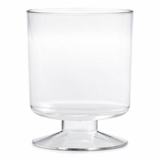 A clear glass trifle bowl with straight sides, a wide opening, and a sturdy, thick pedestal base. The bowl is empty, reminiscent of a JB Prince disposable goblet glass, and photographed against a white background.
